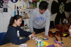 Duke students decorate auction paddles on February 5th to be used for the March 5th Grand Finale auction.